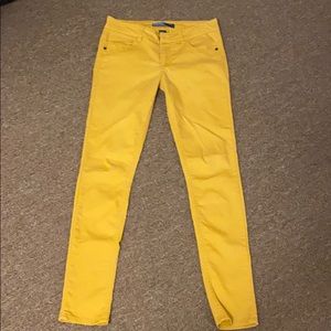 TINSEL size 27 mustard colored skinny denim